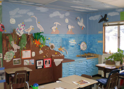 A classroom decorated with student artwork from Ocean Immersions